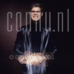 Ad Visser (Date Unknown) at studio in Amsterdam.

[keywords]Posed, Half Length, Eyecontact, Smiling, Rubiks cube[/keywords]